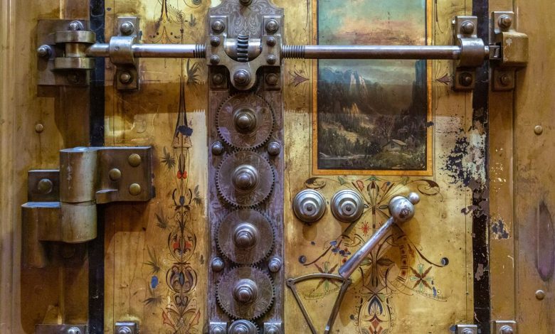 A futuristic digital vault door illustrates secure technology for protecting assets.