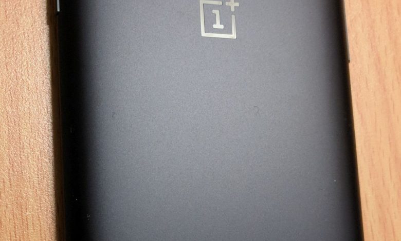 a person unlocking a smartphone with a fingerprint